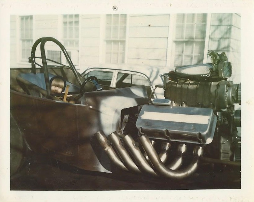 Blake at 2 years old in his dads race car, The Different Drummer